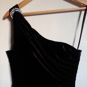 Black velvet one shoulder floor length gown